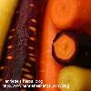 Peeled carrots in three colors.