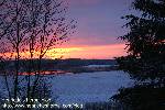 Wintery sunset over a lake.